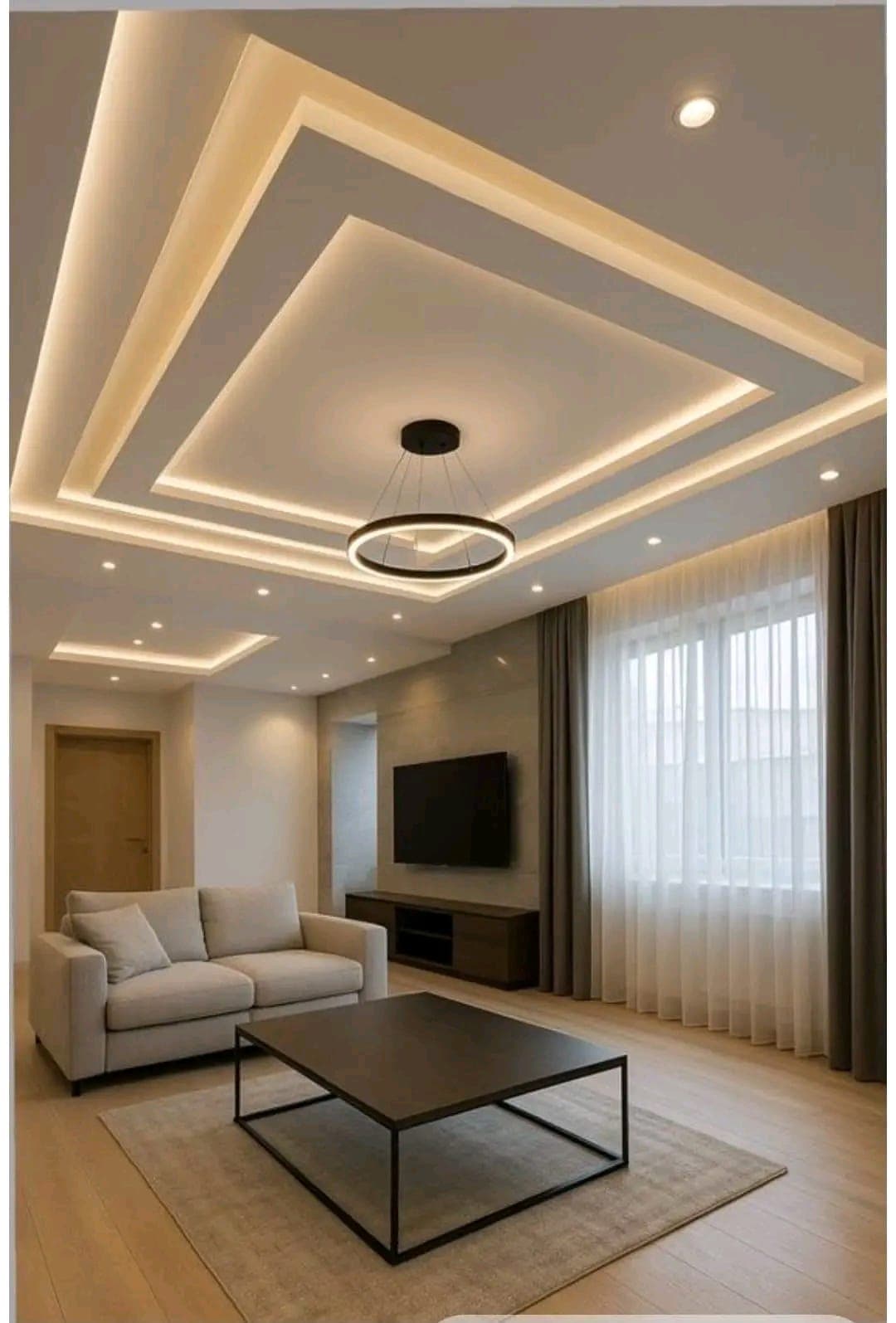 Salon avec faux-plafond et éclairage terminés